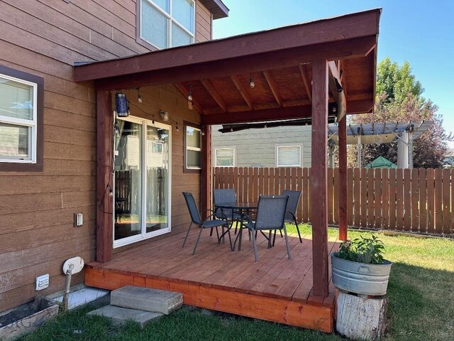 1009 Wyoming St, Belgrade, MT 59714 - wooden terrace featuring outdoor dining space