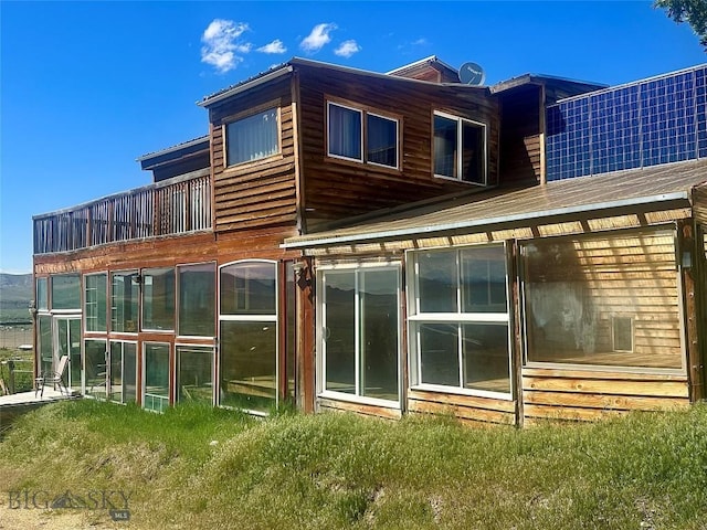 400 Broken Creek Rd, Three Forks, MT 59752 - back of house featuring a sunroom