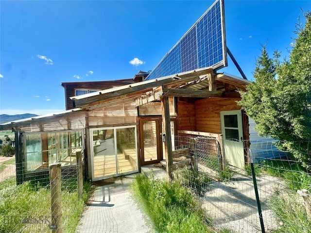 400 Broken Creek Rd, Three Forks, MT 59752 - rear view of house with a sunroom