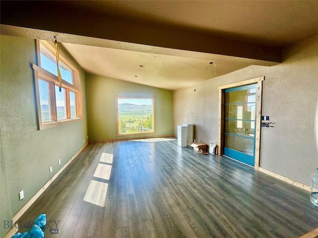 400 Broken Creek Rd, Three Forks, MT 59752 - unfurnished living room with wood finished floors, baseboards, and a textured wall