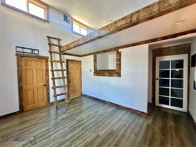 400 Broken Creek Rd, Three Forks, MT 59752 - entrance foyer featuring baseboards, wood finished floors, and a high ceiling