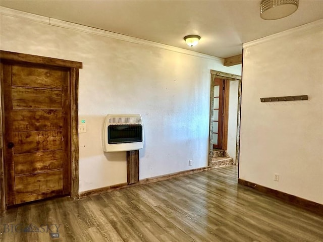 400 Broken Creek Rd, Three Forks, MT 59752 - spare room with heating unit, ornamental molding, wood finished floors, and baseboards