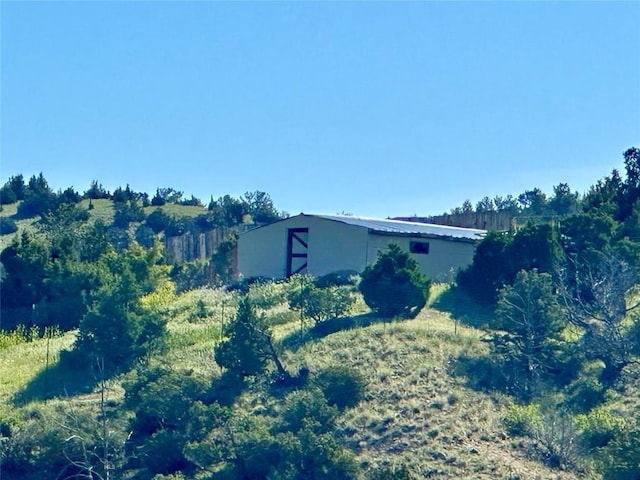 400 Broken Creek Rd, Three Forks, MT 59752 - view of home's exterior featuring an outdoor structure and an outbuilding
