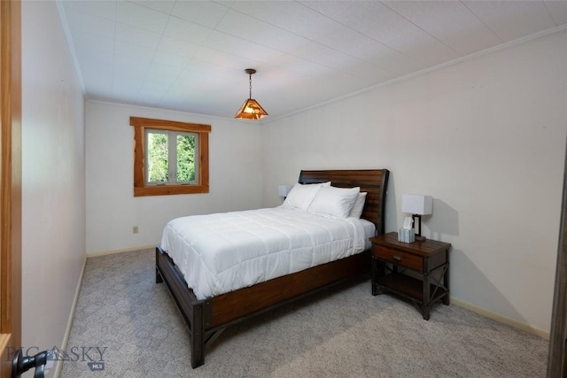495 Jardine Rd, Gardiner, MT 59030 - bedroom featuring carpet floors, crown molding, and baseboards