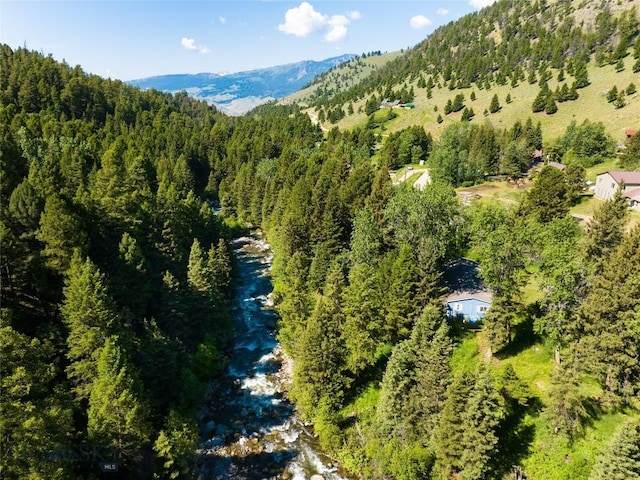 495 Jardine Rd, Gardiner, MT 59030 - aerial overview of property's location featuring a forest and a mountain backdrop