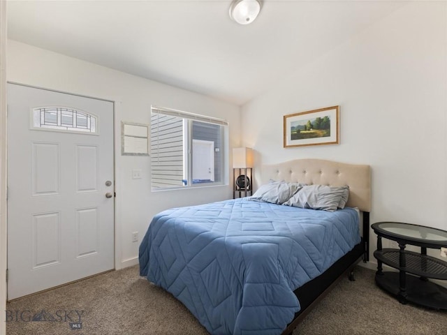 407 Brookline St Unit B, Livingston, MT 59047 - carpeted bedroom featuring vaulted ceiling
