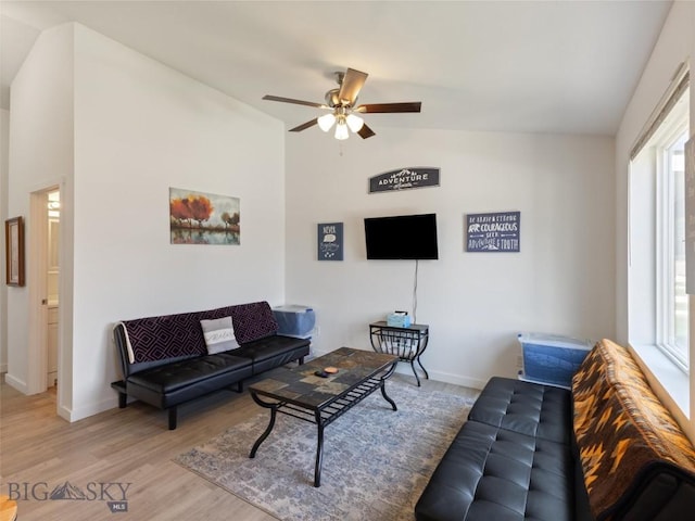407 Brookline St Unit A, Livingston, MT 59047 - living area with lofted ceiling, ceiling fan, wood finished floors, and baseboards