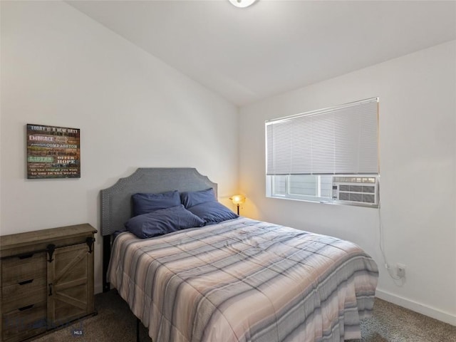 407 Brookline St Unit A, Livingston, MT 59047 - bedroom featuring dark colored carpet, baseboards, and cooling unit