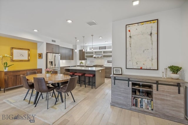 519 E Mendenhall St, Bozeman, MT 59715 - dining space with light wood-type flooring and recessed lighting