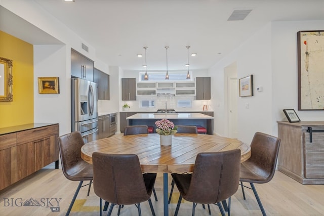 519 E Mendenhall St, Bozeman, MT 59715 - dining room featuring light wood-type flooring and recessed lighting
