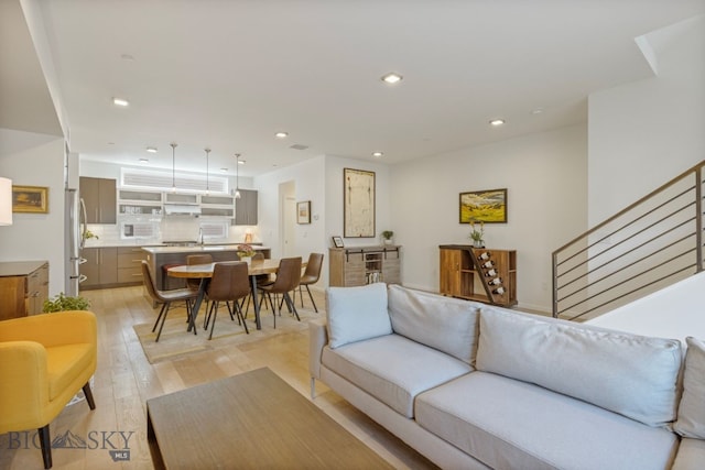 519 E Mendenhall St, Bozeman, MT 59715 - living area with light wood-style flooring, stairway, and recessed lighting