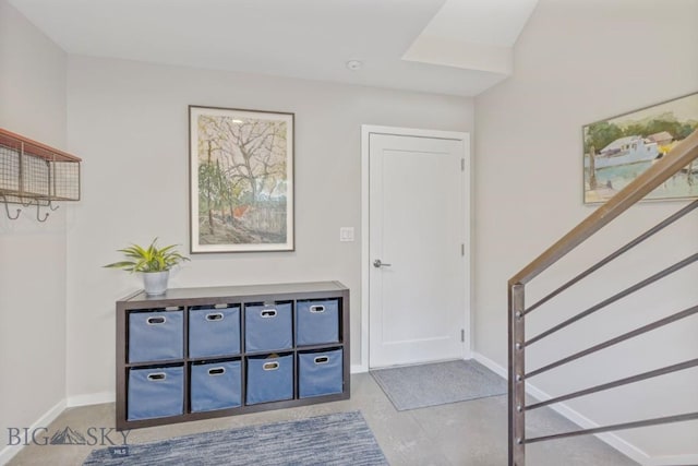 519 E Mendenhall St, Bozeman, MT 59715 - entrance foyer featuring baseboards and stairs
