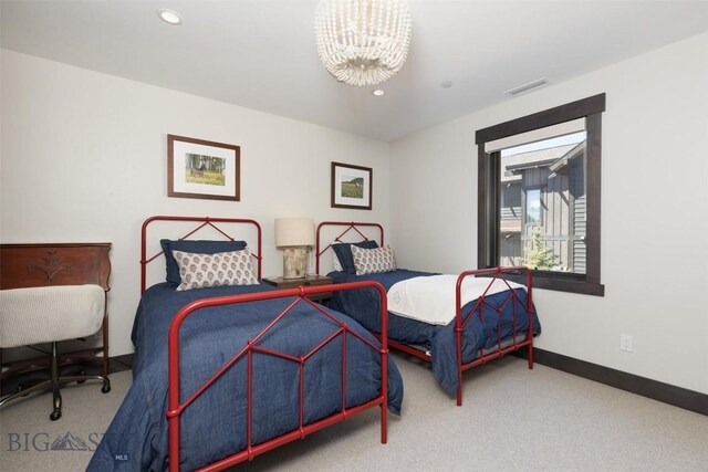 bedroom featuring a chandelier, carpet, baseboards, and recessed lighting