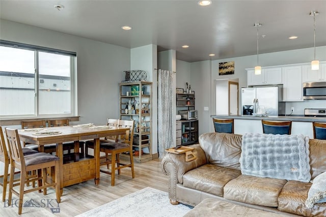 33 Intrepid Dr, Bozeman, MT 59718 - living area featuring light wood finished floors and recessed lighting