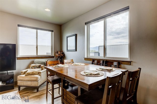 33 Intrepid Dr, Bozeman, MT 59718 - dining room featuring healthy amount of natural light and light wood finished floors