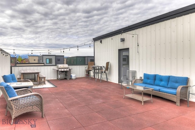 33 Intrepid Dr, Bozeman, MT 59718 - view of patio / terrace featuring a grill and an outdoor living space
