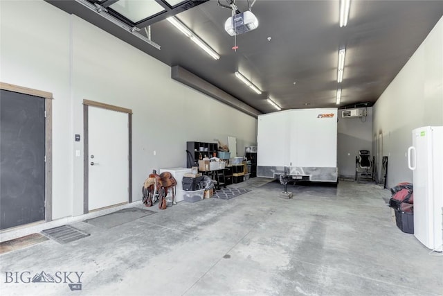 33 Intrepid Dr, Bozeman, MT 59718 - garage with a garage door opener