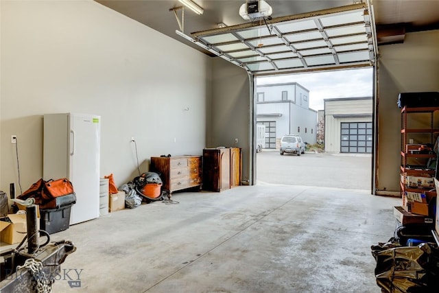 33 Intrepid Dr, Bozeman, MT 59718 - garage featuring a garage door opener