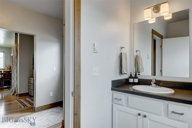 33 Intrepid Dr, Bozeman, MT 59718 - bathroom with vanity and wood finished floors