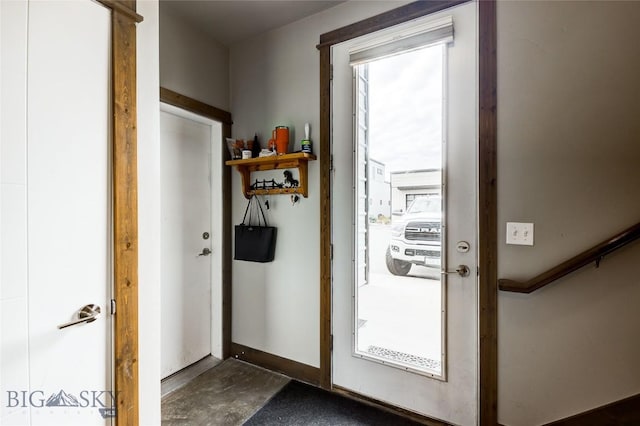 33 Intrepid Dr, Bozeman, MT 59718 - doorway to outside featuring concrete floors