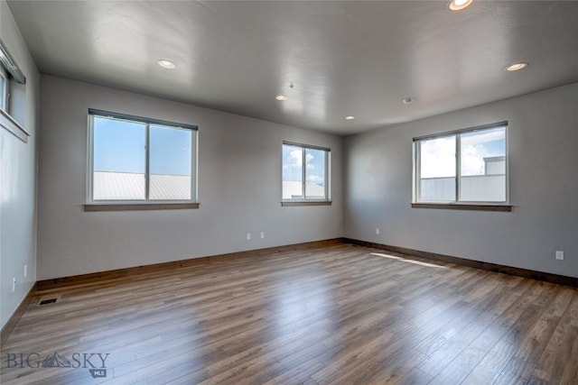 33 Intrepid Dr, Bozeman, MT 59718 - unfurnished room with plenty of natural light, wood finished floors, and recessed lighting
