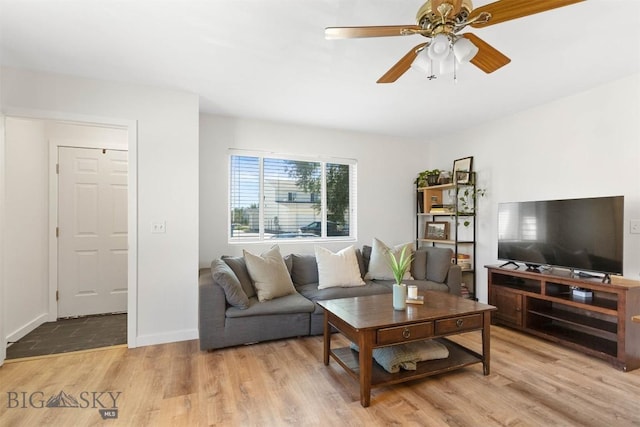 108 10th St Unit B, Belgrade, MT 59714 - living area with a ceiling fan, wood finished floors, and baseboards