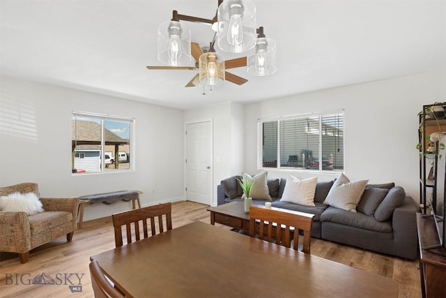 108 10th St Unit B, Belgrade, MT 59714 - dining area with light wood-type flooring and a ceiling fan