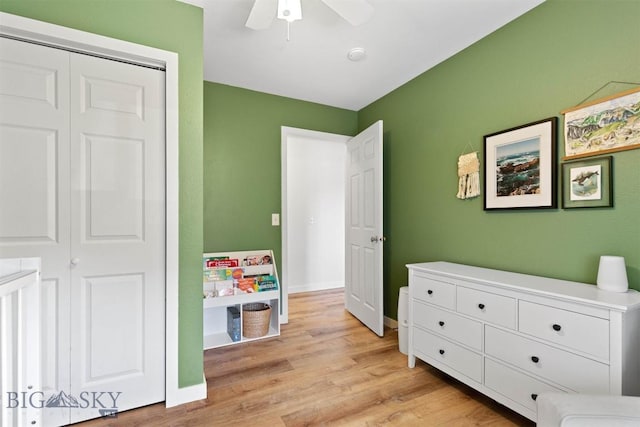 108 10th St Unit B, Belgrade, MT 59714 - bedroom with light wood-type flooring, a closet, a ceiling fan, and baseboards