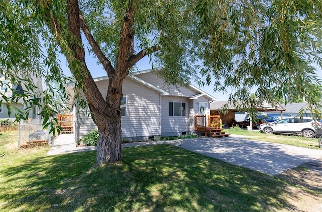 108 10th St Unit B, Belgrade, MT 59714 - view of front of house featuring a front lawn