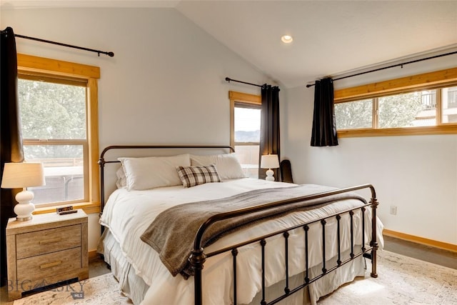 3493 Lolo Way, Bozeman, MT 59718 - bedroom featuring vaulted ceiling, multiple windows, light wood-style flooring, recessed lighting, and baseboards