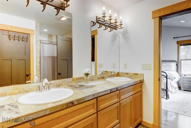 3493 Lolo Way, Bozeman, MT 59718 - ensuite bathroom featuring double vanity and a shower with curtain