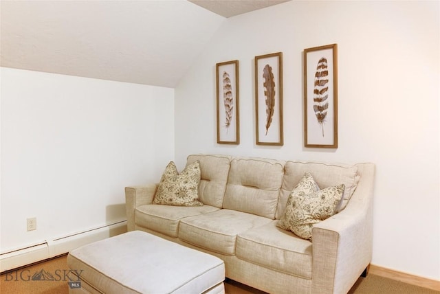 3493 Lolo Way, Bozeman, MT 59718 - carpeted living area with a baseboard radiator and lofted ceiling