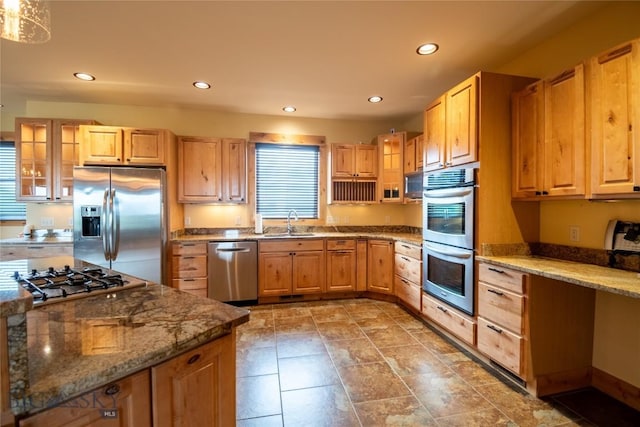 115AND117 Otter Creek Rd, Big Timber, MT 59011 - kitchen featuring stainless steel appliances, a sink, recessed lighting, stone counters, and glass insert cabinets