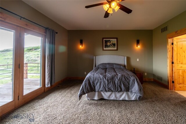 115AND117 Otter Creek Rd, Big Timber, MT 59011 - carpeted bedroom featuring access to outside, baseboards, and a ceiling fan