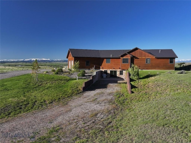 115AND117 Otter Creek Rd, Big Timber, MT 59011 - back of house with metal roof and a yard