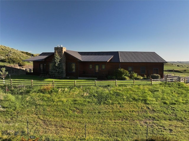 115AND117 Otter Creek Rd, Big Timber, MT 59011 - single story home with a chimney, metal roof, and a rural view