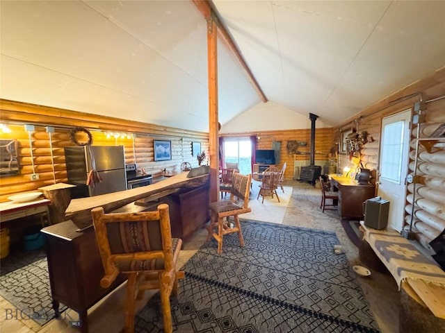 222 S Fork Ray Creek Rd, Townsend, MT 59644 - living room with log walls and a wood stove