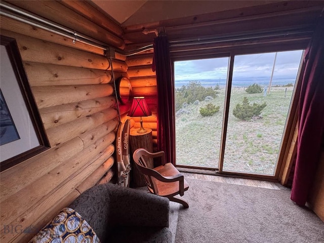 222 S Fork Ray Creek Rd, Townsend, MT 59644 - sitting room featuring rustic walls, carpet flooring, and lofted ceiling