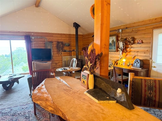 222 S Fork Ray Creek Rd, Townsend, MT 59644 - carpeted office space featuring rustic walls, a wood stove, and lofted ceiling