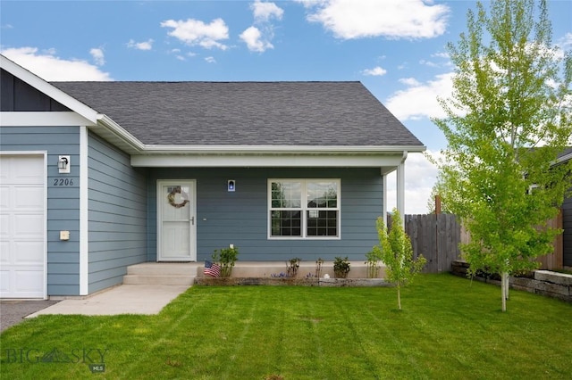 2206 Sturnella Ln, Belgrade, MT 59714 - view of front of house featuring roof with shingles and an attached garage