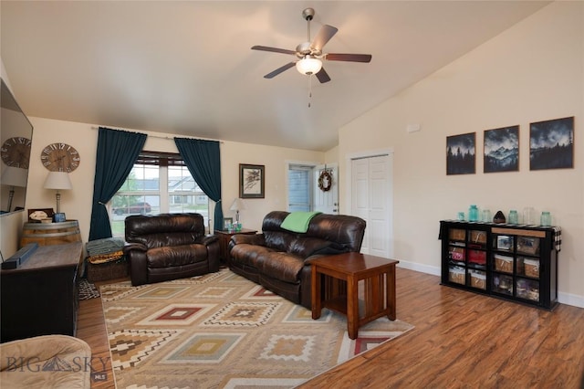 2206 Sturnella Ln, Belgrade, MT 59714 - living area featuring a ceiling fan, wood finished floors, baseboards, and high vaulted ceiling