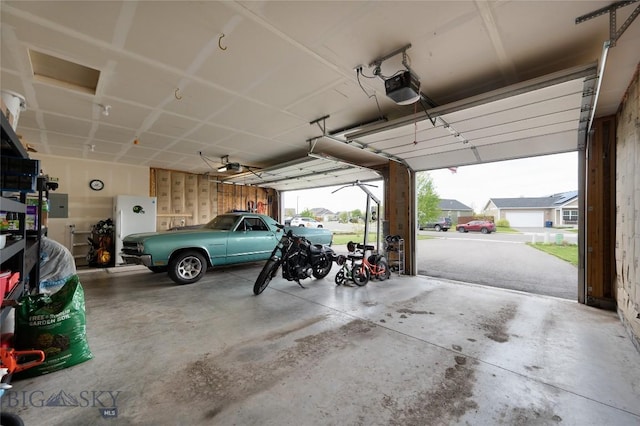 2206 Sturnella Ln, Belgrade, MT 59714 - garage with a garage door opener and electric panel