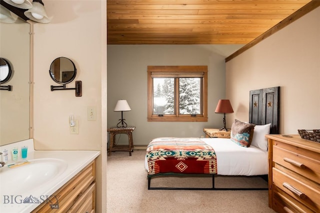 75 Rose Hip Cir, Big Sky, MT 59716 - carpeted bedroom featuring wooden ceiling, a sink, and lofted ceiling
