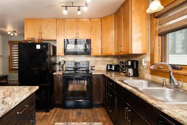 75 Rose Hip Cir, Big Sky, MT 59716 - kitchen with black appliances, a sink, backsplash, and dark wood-style floors