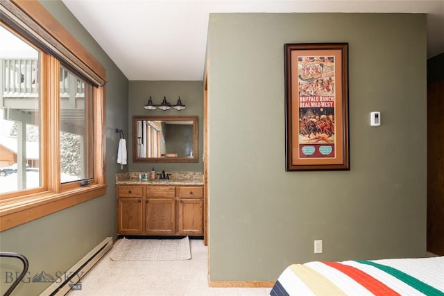 75 Rose Hip Cir, Big Sky, MT 59716 - bedroom featuring a baseboard heating unit and baseboards