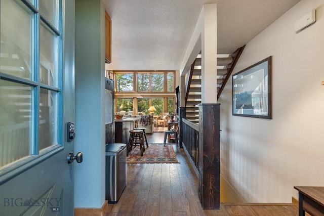 75 Rose Hip Cir, Big Sky, MT 59716 - entrance foyer featuring dark wood-style floors and stairway