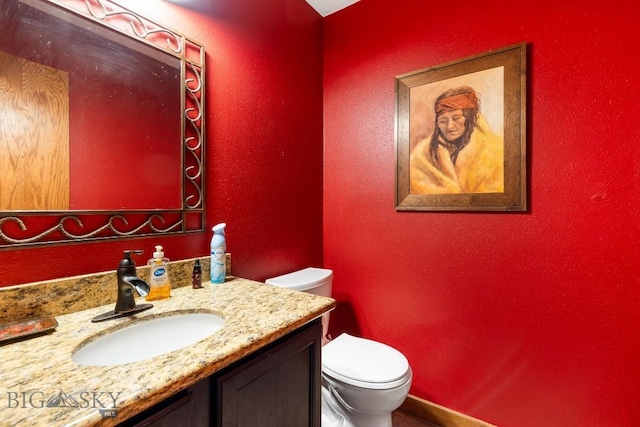 75 Rose Hip Cir, Big Sky, MT 59716 - half bath with vanity and a textured wall