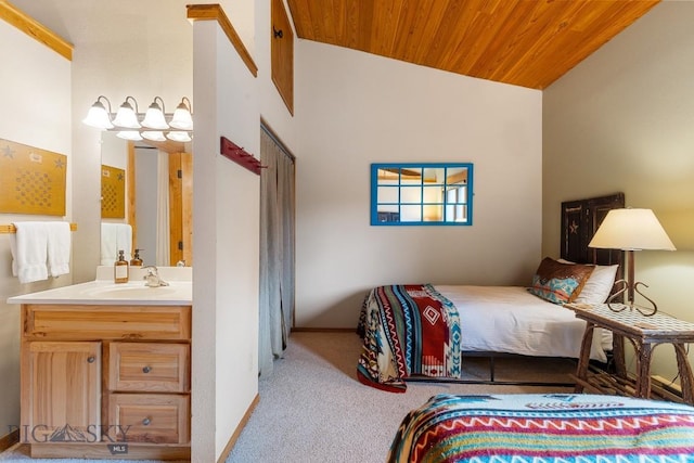 75 Rose Hip Cir, Big Sky, MT 59716 - carpeted bedroom featuring wooden ceiling and ensuite bath