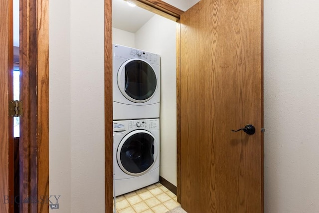 75 Rose Hip Cir, Big Sky, MT 59716 - washroom featuring stacked washing machine and dryer