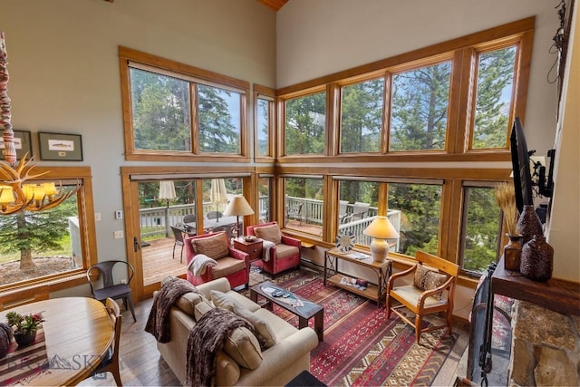 75 Rose Hip Cir, Big Sky, MT 59716 - sunroom featuring a chandelier